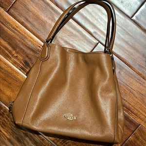 Coach | Edie